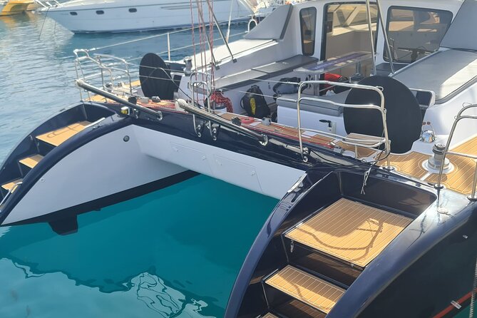 Tenerife Whale watching on private charter - Anchoring in a clear-water cove
